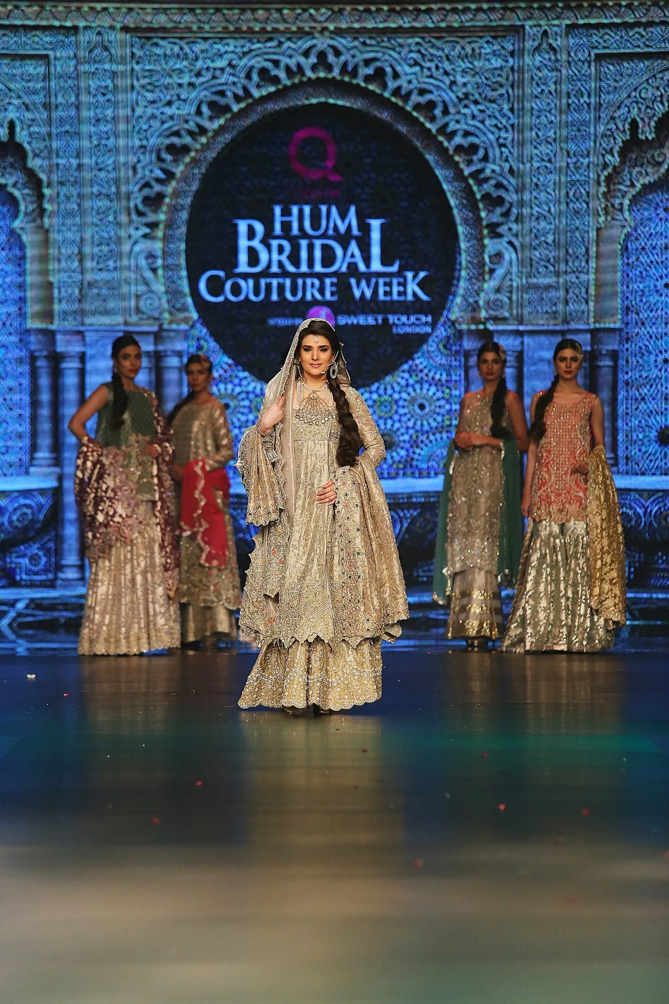 Indian designer embroidered dress in white and gold color # B3353