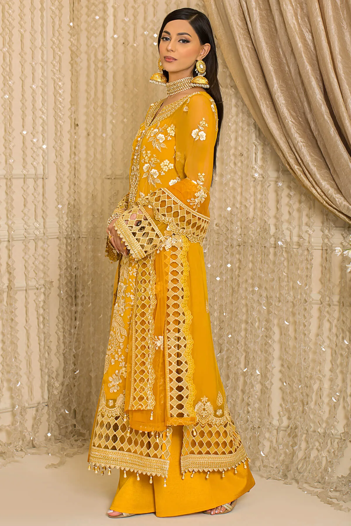 Pakistani Party Wear in Embroidered Yellow Kameez Trousers and Net Dupatta Style Eid Dress